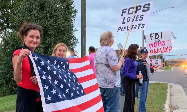 Scores of parents rallied Thursday night outside Luther Jackson Middle School, where the Fairfax County School Board held a meeting. Their stated cause was to "eliminate porn" from county schools, following a local mother