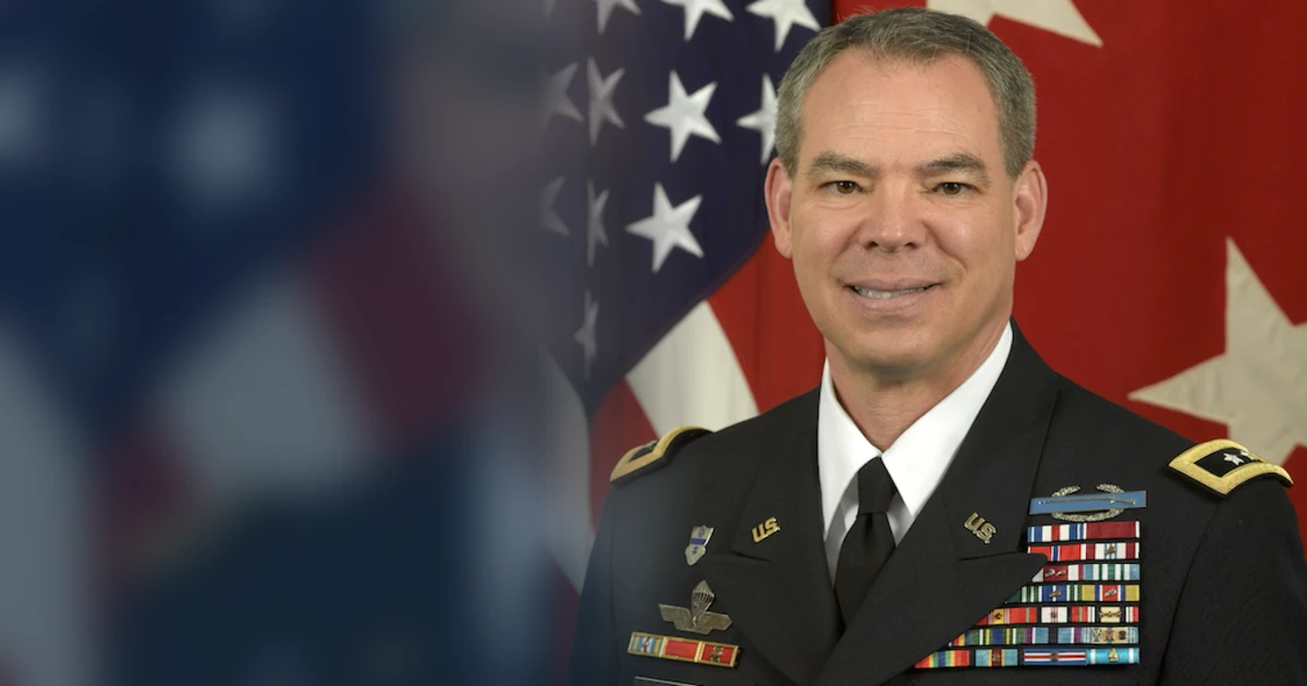 Official Army portrait of retired Maj. Gen. Bert Mizusawa in dress uniform before the American flag
